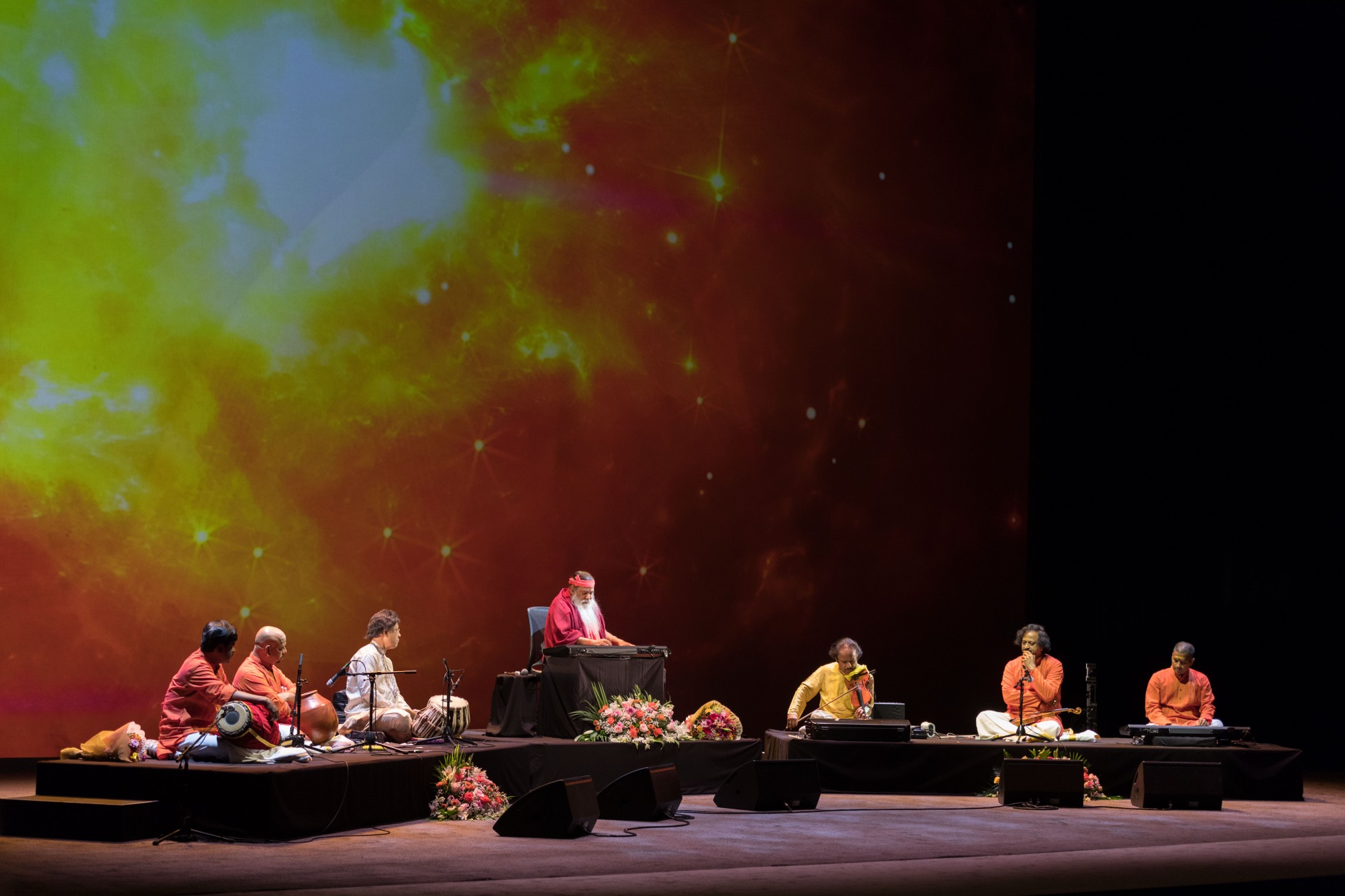 Concert — Sri Swamiji with ensemble, amber starfield